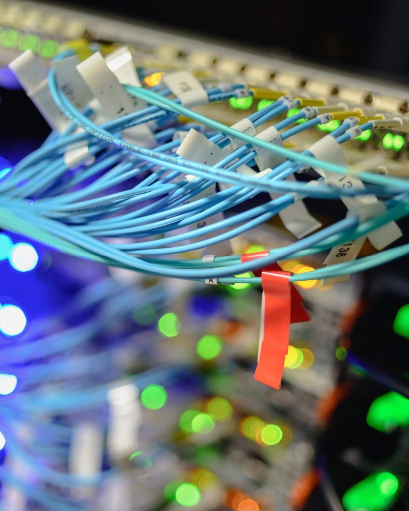 Working servers in data center with a lot of led lamps and cables